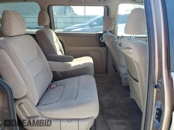 2004 Honda Odyssey LX with VIN 5FNRL18574B102634, listed as a Copart auction lot 54669075 with 141,057 mi miles and Salvage title. Bid and sale history available at DreamBid. Image 11.