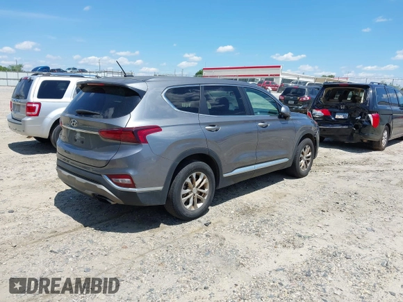 2019 Hyundai Santa Fe SE with VIN 5NMS23AD3KH083786, listed as a IAAI auction lot 42196828 with Not Provided miles and . Bid and sale history available at DreamBid. Image 4.