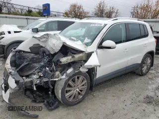 2011 Volkswagen Tiguan SE with VIN WVGBV7AX3BW524219, listed as a Copart auction lot 81911234 with Not provided miles and Salvage title. Bid and sale history available at DreamBid. Image 1.