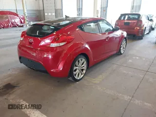 2012 Hyundai Veloster w/Gray Int z VIN KMHTC6AD3CU023998, wystawiony jako IAAI lot #42186875 z przebiegiem 170 771 mil mil oraz . Historia ofert i sprzedaży dostępna na DreamBid. Obrazek 4.