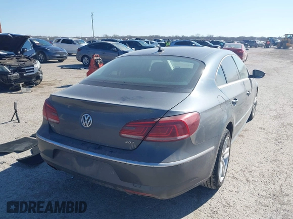 2013 Volkswagen CC Sport with VIN WVWBN7AN0DE551132, listed as a IAAI auction lot 41849514 with 144,557 mi miles. Bid and sale history available at carsss.com. Image 4.