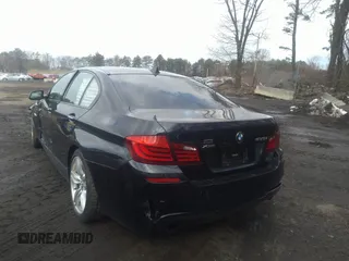 2013 BMW 5 Series 535i xDrive with VIN WBAFU7C55DDU74102, listed as a IAAI auction lot 38809007 with 89,663 mi miles and . Bid and sale history available at carsss.com. Image 3.