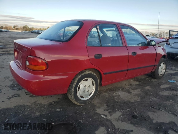 1997 Hyundai Accent z VIN KMHVF24N9VU356190, wystawiony jako Copart lot #85610774 z przebiegiem 91 707 mil mil oraz Tytuł czysty. Historia ofert i sprzedaży dostępna na DreamBid. Obrazek 3.