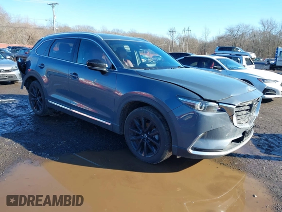 2021 Mazda CX-9 Grand Touring with VIN JM3TCBDY5M0506632, listed as a IAAI auction lot 41589264 with 50,026 mi miles and . Bid and sale history available at carsss.com. Image 1.