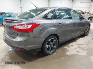 2014 Ford Focus SE with VIN 1FADP3F24EL310431, listed as a IAAI auction lot 41997295 with 108,718 mi miles. Bid and sale history available at carsss.com. Image 4.