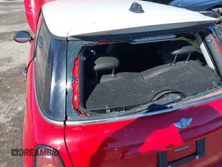 2009 MINI Hardtop S with VIN WMWMF73589TT95974, listed as a IAAI auction lot 41617775 with Not provided miles and . Bid and sale history available at DreamBid. Image 6.