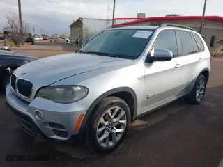 2011 BMW X5 35i with VIN 5UXZV4C5XBL407637, listed as a IAAI auction lot 41454552 with 204,510 mi miles. Bid and sale history available at carsss.com. Image 17.