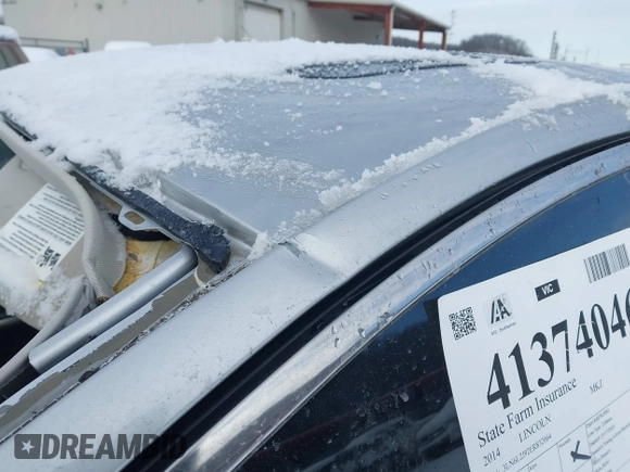 2014 Lincoln MKZ z VIN 3LN6L2J92ER832064, wystawiony jako IAAI lot #41374046 z przebiegiem 84 000 mil mil oraz . Historia ofert i sprzedaży dostępna na DreamBid. Obrazek 12.