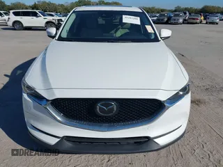 2020 Mazda CX-5 Touring with VIN JM3KFACM6L0737727, listed as a IAAI auction lot 41283200 with 85,949 mi miles and . Bid and sale history available at carsss.com. Image 12.