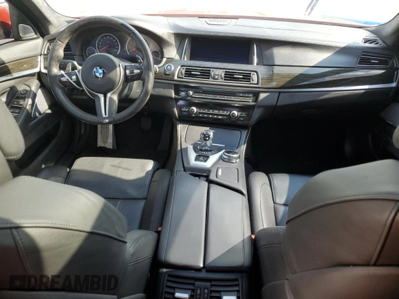 2014 BMW M5 z VIN WBSFV9C58ED097898, wystawiony jako Copart lot #86151234 z przebiegiem 60 470 mil mil oraz Tytuł czysty. Historia ofert i sprzedaży dostępna na DreamBid. Obrazek 8.