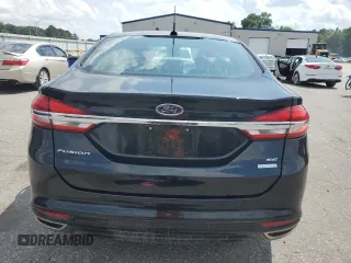 2017 Ford Fusion SE z VIN 3FA6P0H92HR150296, wystawiony jako Copart lot #57075385 z przebiegiem 135 304 mil mil oraz Szkoda całkowita • Salvage title. Historia ofert i sprzedaży dostępna na DreamBid. Obrazek 6.