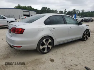 2013 Volkswagen Jetta with VIN 3VW5S7AJ5DM307972, listed as a Copart auction lot 62768225 with 164,118 mi miles and Salvage title. Bid and sale history available at DreamBid. Image 3.