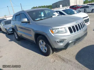 2014 Jeep Grand Cherokee Laredo with VIN 1C4RJEAG7EC547642, listed as a IAAI auction lot 42000432 with 178,996 mi miles. Bid and sale history available at carsss.com. Image 1.