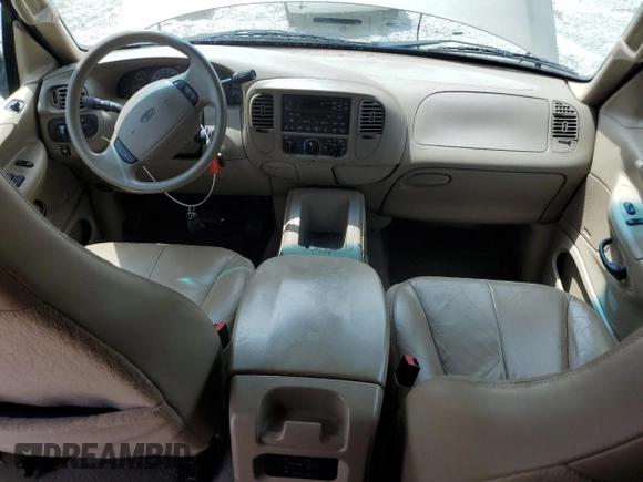 2001 Ford Expedition XLT with VIN 1FMRU15W41LA73480, listed as a Copart auction lot 56740535 with 258,678 mi miles and Salvage title. Bid and sale history available at DreamBid. Image 8.