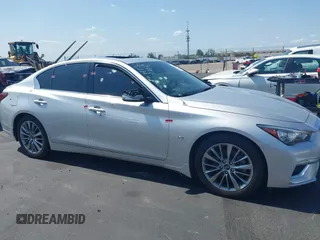 2019 Infiniti Q50 Luxe z VIN JN1EV7AP3KM510305, wystawiony jako IAAI lot #42225255 z przebiegiem 33 902 mil mil oraz . Historia ofert i sprzedaży dostępna na DreamBid. Obrazek 6.