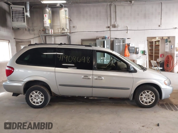 2003 Dodge Grand Caravan with VIN 2D4GP44353R166193, listed as a IAAI auction lot 41908698 with 181,371 mi miles and . Bid and sale history available at DreamBid. Image 13.