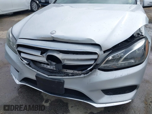 2014 Mercedes-Benz E E 350 Sport with VIN WDDHF5KB8EB009303, listed as a IAAI auction lot 42014846 with 97,214 mi miles. Bid and sale history available at carsss.com. Image 17.