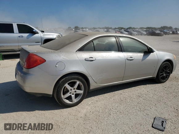 2008 Pontiac G6 z VIN 1G2ZG57N184198212, wystawiony jako Copart lot #70977674 z przebiegiem 118 154 mil mil oraz Czysty tytuł • Clean title. Historia ofert i sprzedaży dostępna na DreamBid. Obrazek 3.