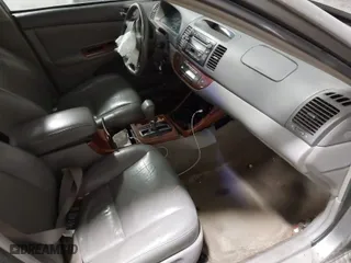 2004 Toyota Camry LE with VIN 4T1BF30K54U578096, listed as a IAAI auction lot 41528597 with 226,027 mi miles. Bid and sale history available at carsss.com. Image 5.