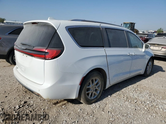 2021 Chrysler Pacifica Touring L with VIN 2C4RC1BG2MR574402, listed as a Copart auction lot 88883045 with Not provided miles and Salvage title. Bid and sale history available at DreamBid. Image 3.