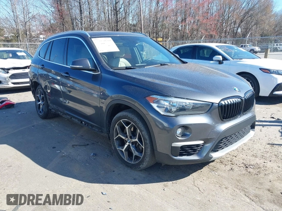 2018 BMW X1 xDrive28i z VIN WBXHT3C31J3H31737, wystawiony jako IAAI lot #41698670 z przebiegiem 68 017 mil mil oraz . Historia ofert i sprzedaży dostępna na DreamBid. Obrazek 1.