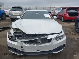2016 BMW 4 Series 428i with VIN WBA3N7C54GK227475, listed as a IAAI auction lot 40963425 with 87,408 mi miles and . Bid and sale history available at carsss.com. Image 12.