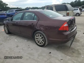 2012 Ford Fusion SEL z VIN 3FAHP0JA5CR184593, wystawiony jako Copart lot #61647265 z przebiegiem 127 720 mil mil oraz Szkoda całkowita • Salvage title. Historia ofert i sprzedaży dostępna na DreamBid. Obrazek 2.
