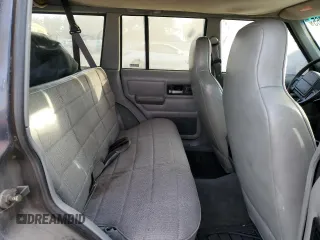 1996 Jeep Cherokee Sport with VIN 1J4FT68S4TL333342, listed as a Copart auction lot 41664965 with 185,199 mi miles and Clean Title. Bid and sale history available at carsss.com. Image 11.