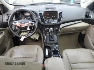 2015 Ford Escape Titanium with VIN 1FMCU0JX5FUA08248, listed as a Copart auction lot 53635435 with 120,010 mi miles and Salvage Title. Bid and sale history available at DreamBid. Image 8.
