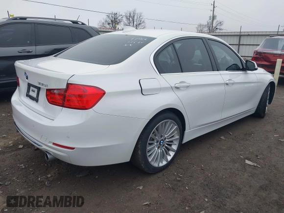 2014 BMW 3 Series 335i with VIN WBA3A9G50ENS65136, listed as a IAAI auction lot 41504021 with 60,892 mi miles. Bid and sale history available at carsss.com. Image 4.