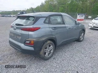 2019 Hyundai Kona SE with VIN KM8K12AA0KU257384, listed as a IAAI auction lot 42049777 with 91,000 mi miles. Bid and sale history available at carsss.com. Image 4.