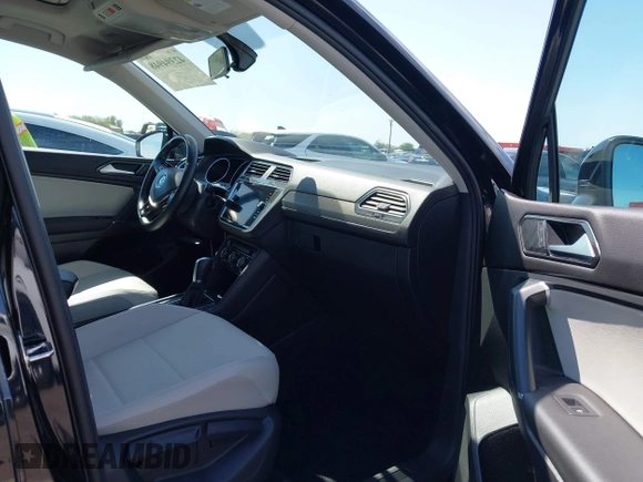 2018 Volkswagen Tiguan SEL with VIN 3VV3B7AX4JM056650, listed as a IAAI auction lot 42394948 with 35,696 mi miles and . Bid and sale history available at DreamBid. Image 5.