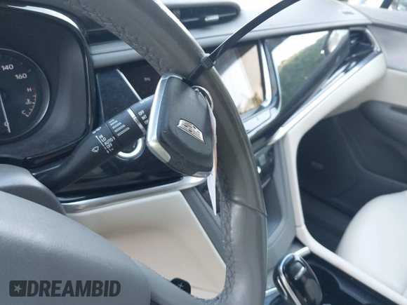 2022 Cadillac XT6 Premium Luxury z VIN 1GYKPDRS3NZ124924, wystawiony jako IAAI lot #42215418 z przebiegiem 32 368 mil mil oraz . Historia ofert i sprzedaży dostępna na DreamBid. Obrazek 11.