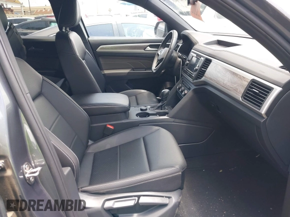 2023 Volkswagen Atlas SE with VIN 1V2LC2CA7PC212471, listed as a IAAI auction lot 42422043 with 24,495 mi miles and . Bid and sale history available at DreamBid. Image 5.