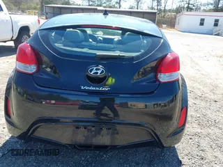 2013 Hyundai Veloster w/Gray Int with VIN KMHTC6AD9DU137473, listed as a IAAI auction lot 41846203 with 67,781 mi miles. Bid and sale history available at carsss.com. Image 16.