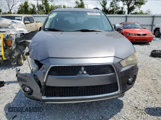 2010 Mitsubishi Outlander XLS z VIN JA4JS4AX2AZ014121, wystawiony jako Copart lot #56403435 z przebiegiem 119 121 mil mil oraz Nie do naprawy • Non repairable. Historia ofert i sprzedaży dostępna na DreamBid. Obrazek 5.