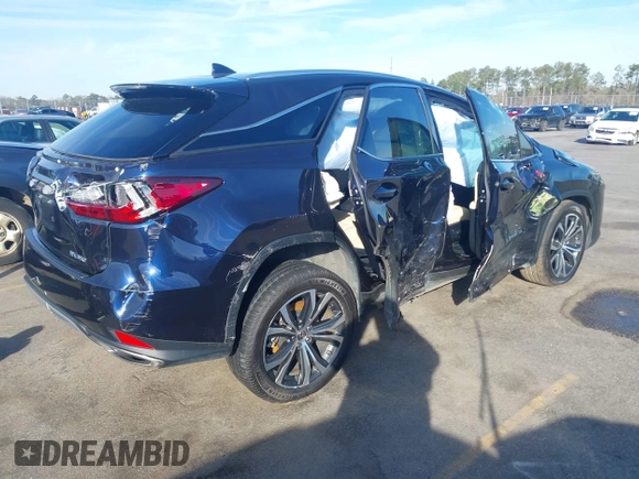 2022 Lexus RX with VIN 2T2HZMAA6NC228908, listed as a IAAI auction lot 41592778 with 46,966 mi miles. Bid and sale history available at carsss.com. Image 4.