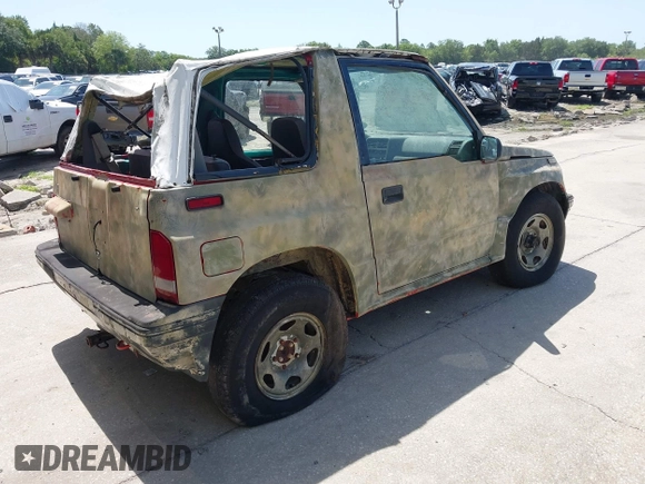 1995 Chevrolet Tracker z VIN 2CNBJ1869S6911342, wystawiony jako IAAI lot #42265392 z przebiegiem 121 944 mil mil oraz . Historia ofert i sprzedaży dostępna na DreamBid. Obrazek 4.