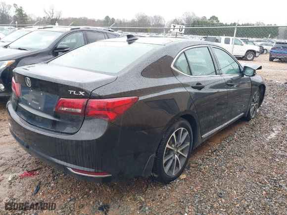 2015 Acura TLX V6 Tech with VIN 19UUB2F50FA016665, listed as a IAAI auction lot 41563642 with 161,386 mi miles. Bid and sale history available at carsss.com. Image 4.