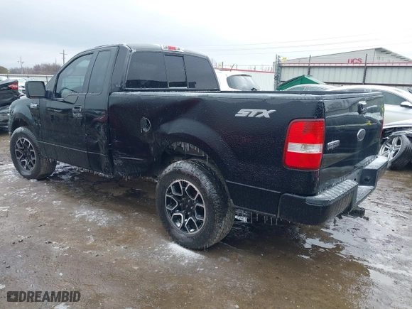 2005 Ford F-150 XL with VIN 1FTRF12W15KC00040, listed as a IAAI auction lot 41532710 with 172,371 mi miles. Bid and sale history available at carsss.com. Image 3.