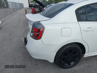 2012 Nissan Sentra 2.0 z VIN 3N1AB6AP0CL701340, wystawiony jako IAAI lot #42094800 z przebiegiem 189 128 mil mil oraz . Historia ofert i sprzedaży dostępna na DreamBid. Obrazek 6.