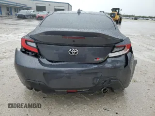 2022 Toyota GR86 Premium with VIN JF1ZNBE13N9757764, listed as a Copart auction lot 77310404 with 12,589 mi miles and Salvage Title. Bid and sale history available at carsss.com. Image 6.