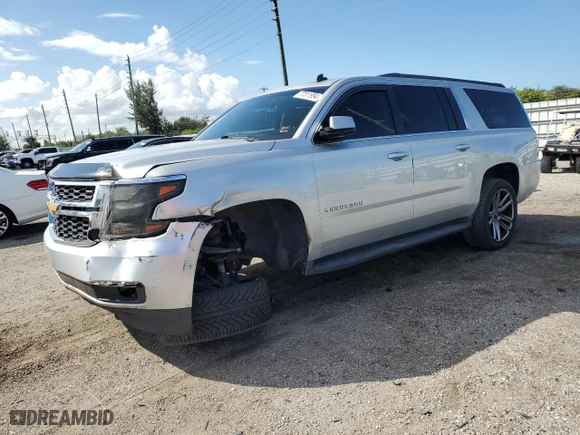 2015 Chevrolet Suburban LS with VIN 1GNSCHKC0FR142513, listed as a Copart auction lot 77311994 with 185,263 mi miles and Salvage Title. Bid and sale history available at carsss.com. Image 1.