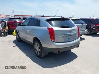 2015 Cadillac SRX Luxury Collection z VIN 3GYFNBE35FS627640, wystawiony jako IAAI lot #42262843 z przebiegiem 211 669 mil mil oraz . Historia ofert i sprzedaży dostępna na DreamBid. Obrazek 3.