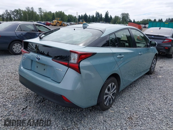 2020 Toyota Prius LE with VIN JTDL9RFU1L3017670, listed as a IAAI auction lot 42694974 with 69,298 mi miles and . Bid and sale history available at DreamBid. Image 4.