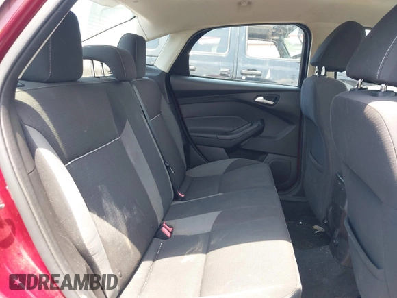 2013 Ford Focus SE z VIN 1FADP3F26DL242146, wystawiony jako IAAI lot #42679877 z przebiegiem 207 908 mil mil oraz . Historia ofert i sprzedaży dostępna na DreamBid. Obrazek 8.