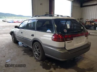 1999 Subaru Legacy Outback with VIN 4S3BG6850X7659883, listed as a IAAI auction lot 42233605 with 147,606 mi miles and . Bid and sale history available at DreamBid. Image 3.