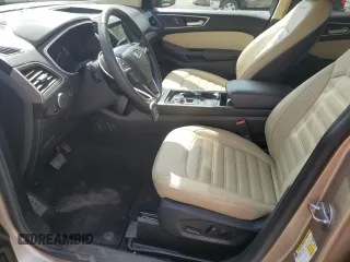 2020 Ford Edge SEL z VIN 2FMPK3J91LBB64038, wystawiony jako Copart lot #56422515 z przebiegiem 47 219 mil mil oraz Szkoda całkowita • Salvage title. Historia ofert i sprzedaży dostępna na DreamBid. Obrazek 7.