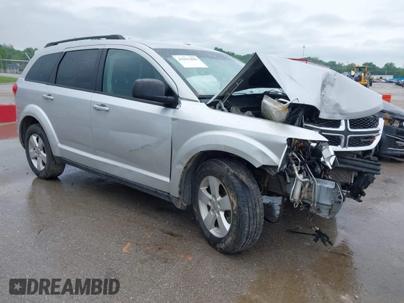 2013 Dodge Journey Canada Value z VIN 3C4PDCABXDT563439, wystawiony jako IAAI lot #42227899 z przebiegiem 213 199 mil mil oraz . Historia ofert i sprzedaży dostępna na DreamBid. Obrazek 1.