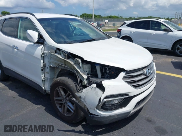 2017 Hyundai Santa Fe 2.4L z VIN 5NMZU3LB9HH034850, wystawiony jako IAAI lot #42342054 z przebiegiem 192 154 mil mil oraz . Historia ofert i sprzedaży dostępna na DreamBid. Obrazek 6.